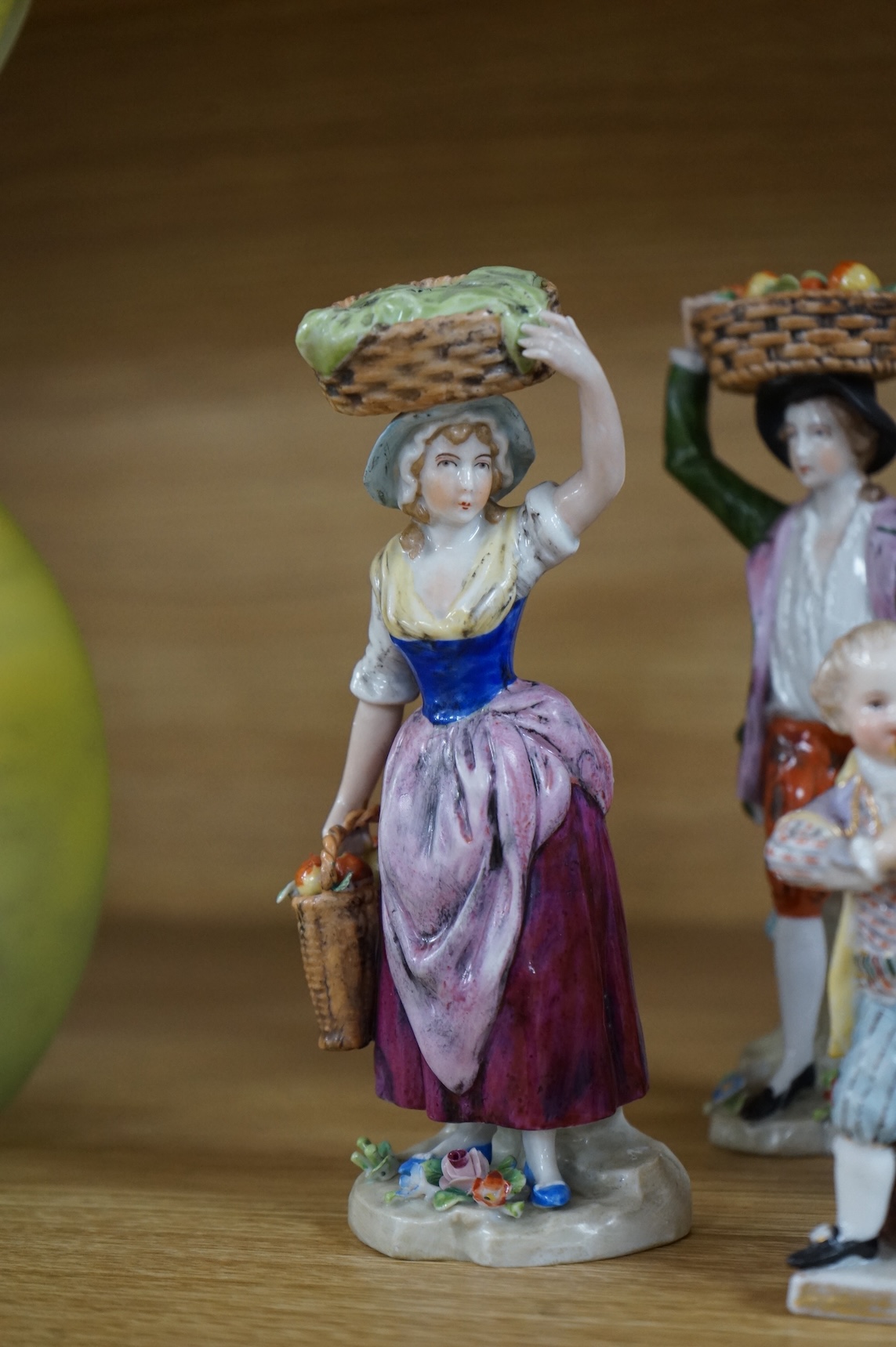 A collection of ten German and English porcelain figures and figure groups, mainly late 19th century, to include Dresden, largest 17cm high